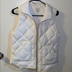 white j crew puffy vest with gold zipper